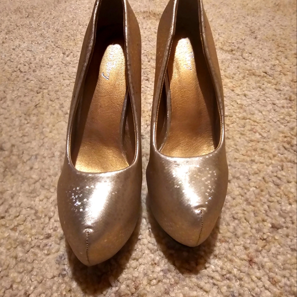 High heels with spikey spine heels size 8.5